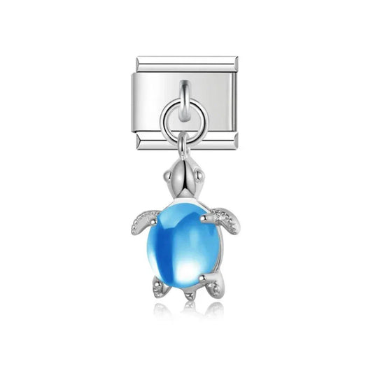 Charm Italien Blue Turtle – tortue argentée avec nacre bleue | bijou fantaisie Emano Nouvelle-Calédonie.